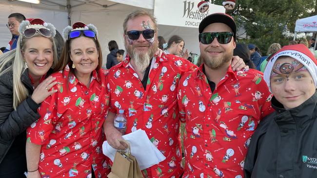 Laura Altinay, Vanessa Evans, Karly Wilhelm, Kyle Cassidy and Bodhi Long helped out with the children's activities at Manningham's 2022 Carols.