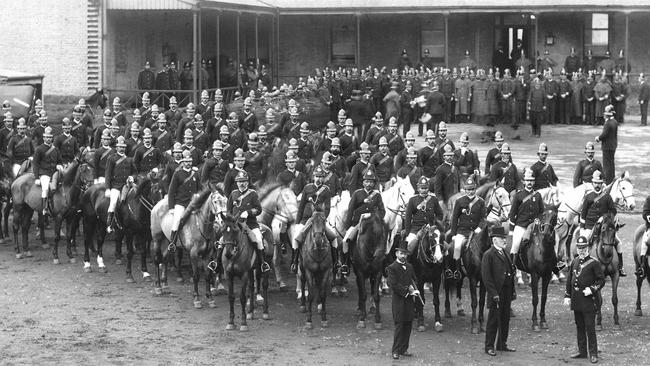 Police in the yard of the Russell St police complex in 1897.