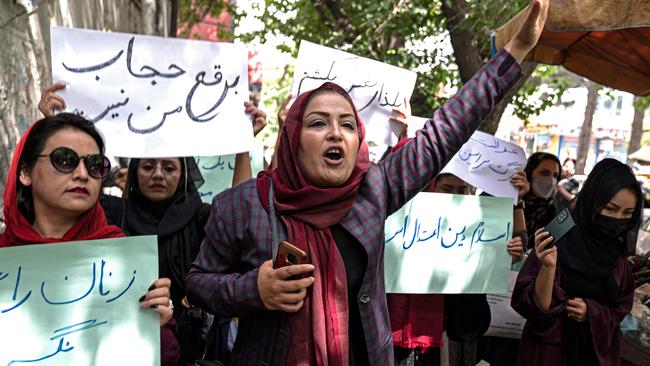 Members of Afghanistan's Powerful Women Movement take part in a protest in Kabul on May 10.