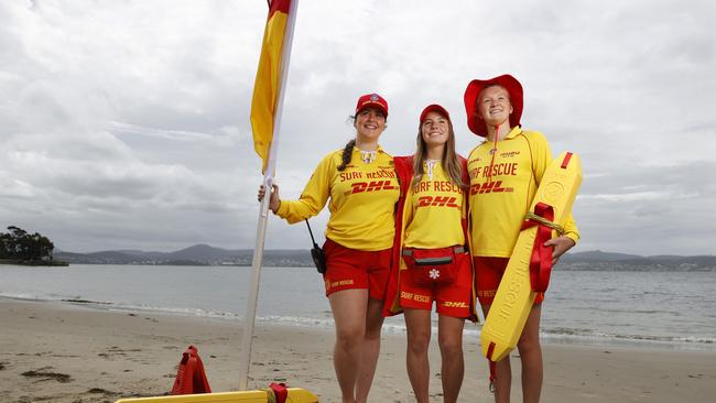 Sophie Sherlock 18 and Holli Fitzgerald 18 from Carlton Park Surf Life Saving Club with Tempest Enright-Norris 18 from Kingston Beach Surf Life Saving Club who will take part in beach patrols this Summer. Summer beach patrols begin this weekend on Tasmanian beaches. Picture: Nikki Davis-Jones