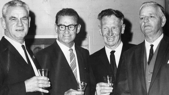 Magarey medallists at a reception before the 1965 count Alec Lill, left, (Norwood, 1925), Bruce McGregor (West Adelaide, 1926-27), G. B. "Blue" Johnston (Glenelg, 1934), and W. McCallum (Norwood, 1936).