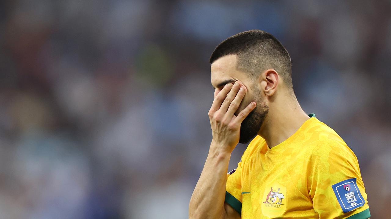 Aziz Behich of Australia shows dejection