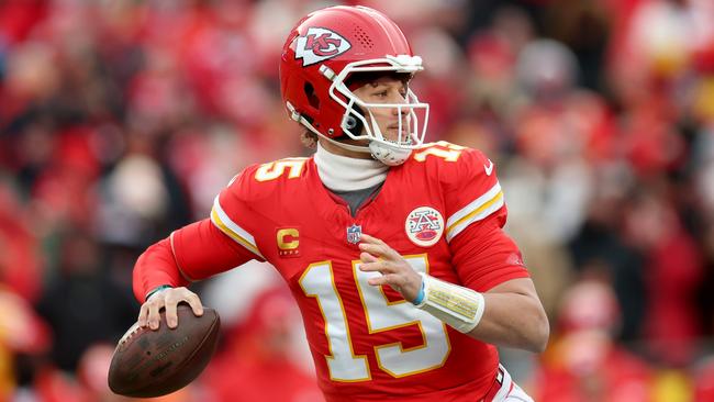 KANSAS CITY, MISSOURI - JANUARY 18: Patrick Mahomes #15 of the Kansas City Chiefs looks to pass against the Houston Texans during the first quarter in the AFC Divisional Playoff at GEHA Field at Arrowhead Stadium on January 18, 2025 in Kansas City, Missouri. (Photo by Jamie Squire/Getty Images)