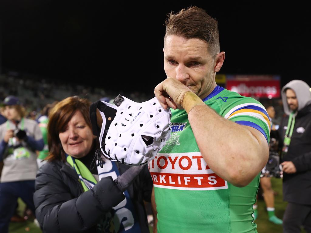 Croker embraces his mother after playing his 300th game. Picture: Getty Images