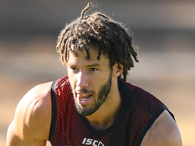 MELBOURNE, AUSTRALIA - MAY 07: Zac Clarke of the Bombers handballs during an Essendon Bombers AFL training session at The Hangar on May 07, 2019 in Melbourne, Australia. (Photo by Quinn Rooney/Getty Images)