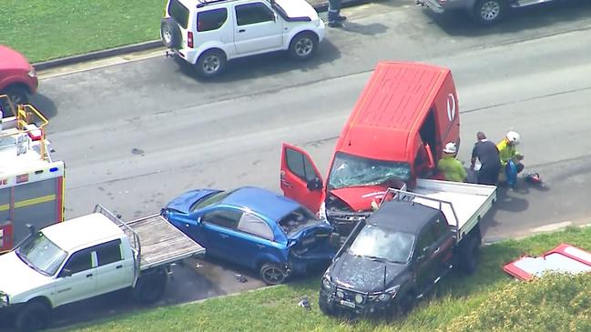 Emergency services at the scene of a four-car pileup in Logan. PHOTOS: 7NEWS