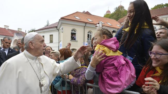 Pope Francis meets fans yesterday in Vilnius at the start of his four-day tour of Lithuania, Latvia and Estonia. Picture: AFP