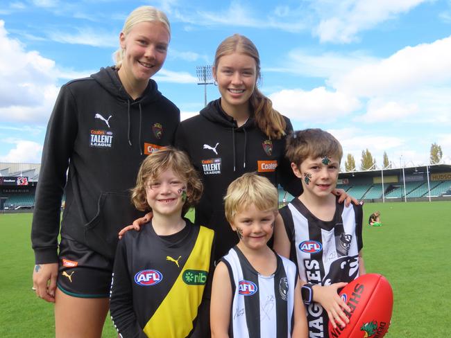 Archie Steers, Louis Whitmore and Oliver Whitmore with Devils Coates Talent League players Ella and Lily Nast. Picture: Jon Tuxworth