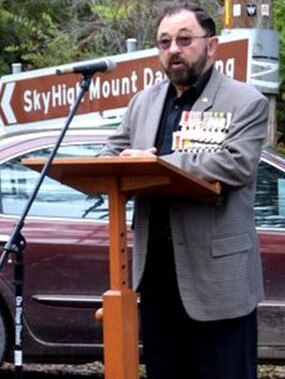 Donohue was charged after being photographed ‘reflecting on the Anzac and Australian spirit” in front of almost 200 people at the Mount Dandenong Anglican Parish on ANZAC Day in 2013.