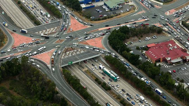 A crash on the M1 just north of Exit 54 at Oxenford. Pic by David Clark.