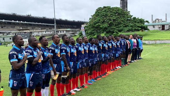 Cameroon sing the anthem ahead of their clash.