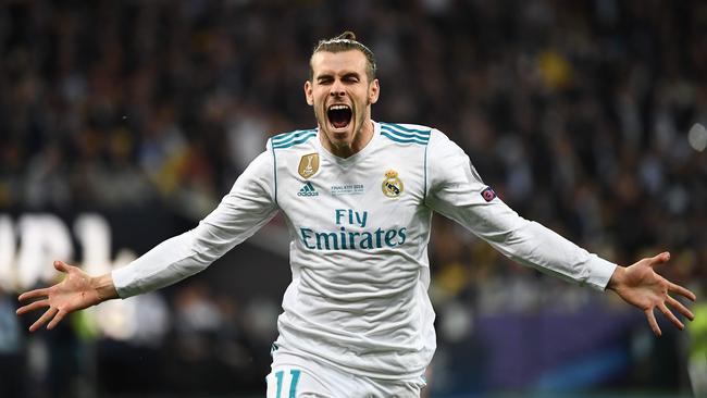 Gareth Bale celebrates after scoring his team's second goal — one of the best ever.