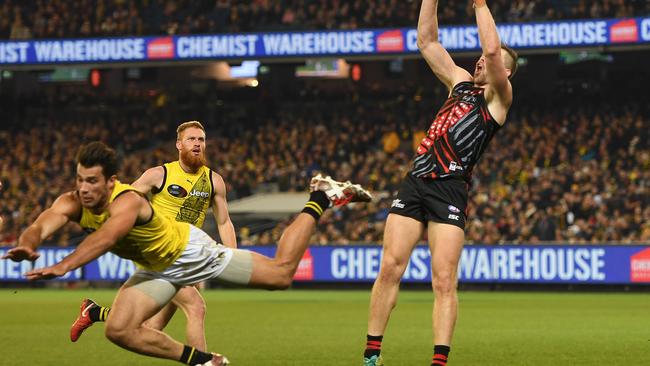 Alex Rance received a free kick for a push in this marking contest.