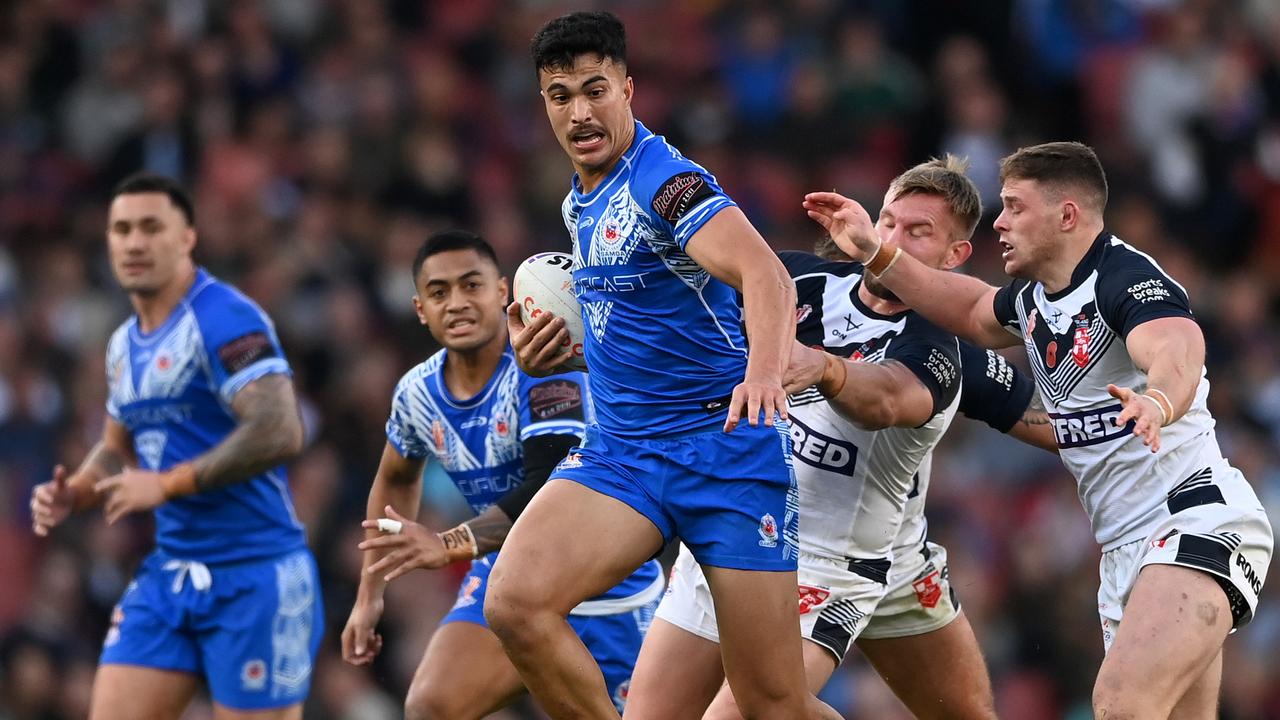 LONDON, ENGLAND - NOVEMBER 12: Joseph Suaalii of Samoa makes a break during the Rugby League World Cup Semi-Final match between England/Papua New Guinea and Tonga/Samoa at Emirates Stadium on November 12, 2022 in London, England. (Photo by Gareth Copley/Getty Images)