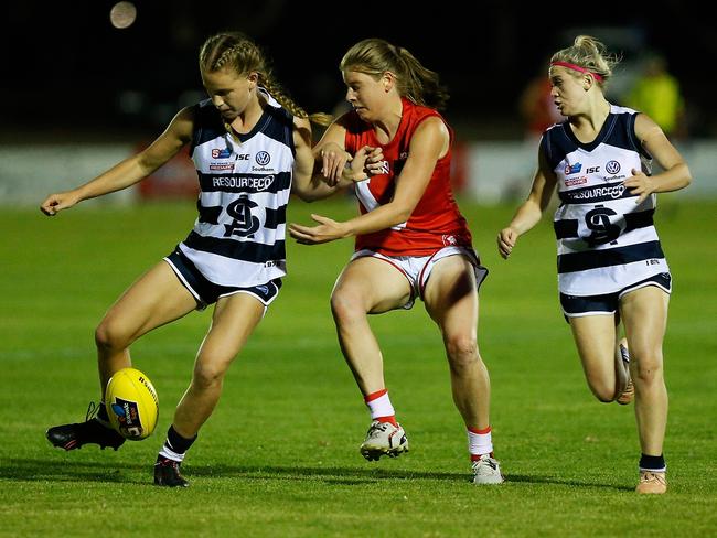 South Adelaide's Teah Charlton manages to get her kick away in the Panthers' clash against North Adelaide. Picture: Deb Curtis