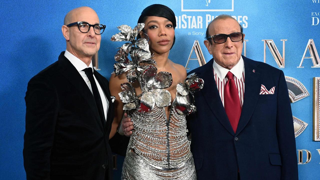 Stanley Tucci, Naomi Ackie and US record producer Clive Davis at the premiere of I Wanna Dance With Somebody in New York City. Picture: Andrea Renault / AFP.