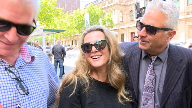 Former Health Services Union boss Kathy Jackson (centre) and her partner Michael Lawler (right) leave Melbourne's County Court where she is fighting charges she misappropriated almost $500,000 in union funds. Picture: AAP Image/Alex Murray.