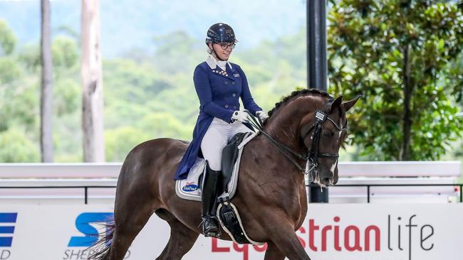 Mary Nitschke riding Utopian Cardinal