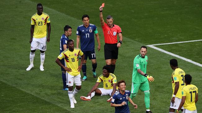Carlos Sanchez (No.6) is shown a straight red card in the World Cup match against Japan. Picture: Getty Images