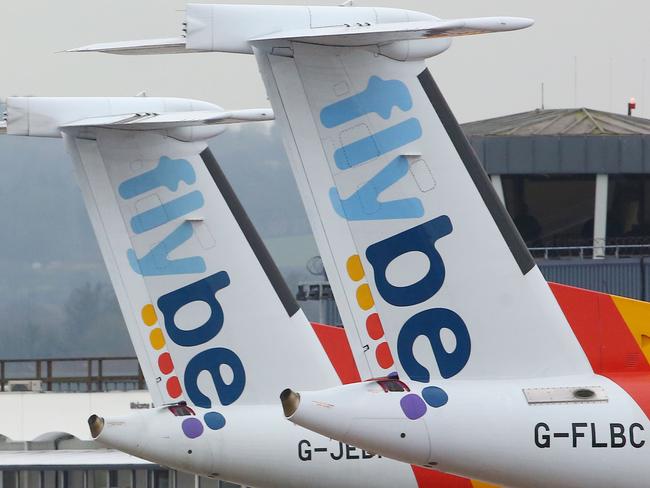 Flybe aircraft are pictured on the tarmac at Exeter airport in Exeter following the news that the airline had collapsed into bankruptcy. Picture: AFP