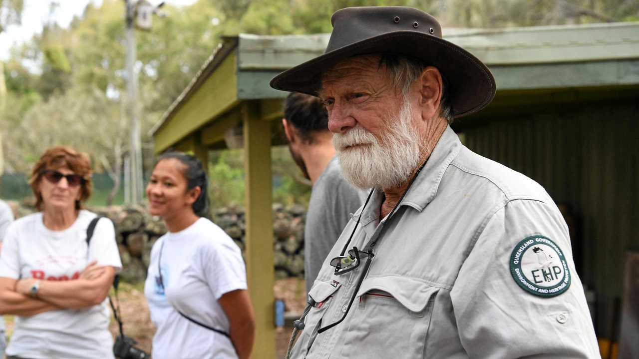 MON REPOS: Department of Environment and Heritage Protection Chief Scientist Dr Col Limpus released a satellite-tagged flatback turtle named Wave Rider. Picture: Mike Knott BUN121216TURTLE5