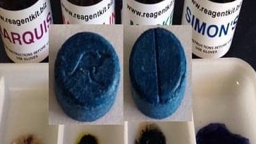 An ecstasy tablet stamped with the Qantas "Flying Kangaroo" logo.