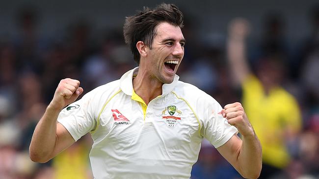 Australian bowler Pat Cummins reacts after dismissing England batsman Moeen Ali. Photo: AAP