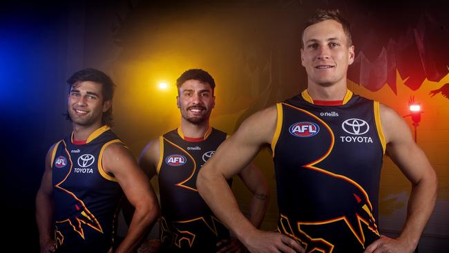 Tuesday, 11th April, 2023 – Adelaide Crows release a Gather Round Jumper – worn by Josh Rachele, Jordan Dawson and Izak Rankine. Picture: Sarah Reed via AFC