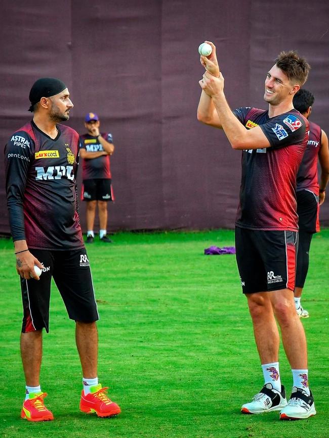 Cricketers Harbhajan Singh and Pat Cummins at training with the Kolkata Knight Riders during India’s IPL tournament.