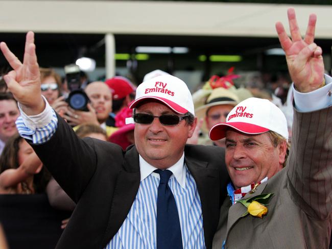 Lee Freedman with owner Tony Santic showing three fingers to signify three Melbourne Cup wins.