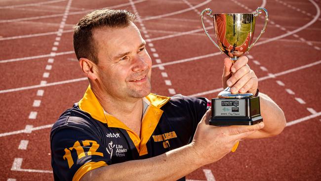 Whittlesea City Little Athletics coach Craig Chapman with his trophy for coach of the year. Picture: Mark Dadswell