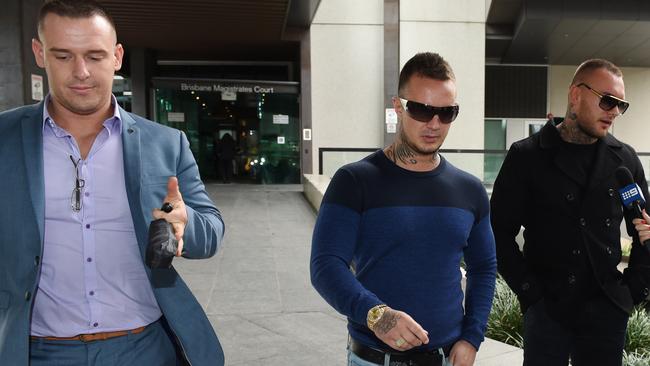 (L to R) Benjamin Thornton, Zivko Stojakovic, and George Bejat leave the Magistrates Court in Brisbane after a sentencing hearing for the 2013 Broadbeach bikie brawl. Picture: AAP Image