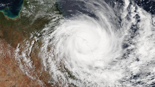 This NOAA/NASA handout photo shows Tropical Cyclone Debbie as a Category 4 system in 2017 Picture: AFP PHOTO