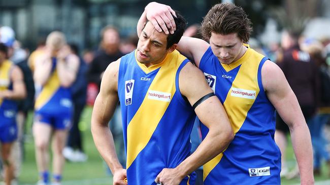 Jaylon Thorpe is comforted after his late miss for Williamstown in Sunday’s preliminary final. Picture: Getty Images.