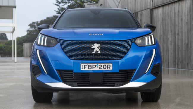 The 2023 Peugeot e-2008 GT has claw-like headlights.