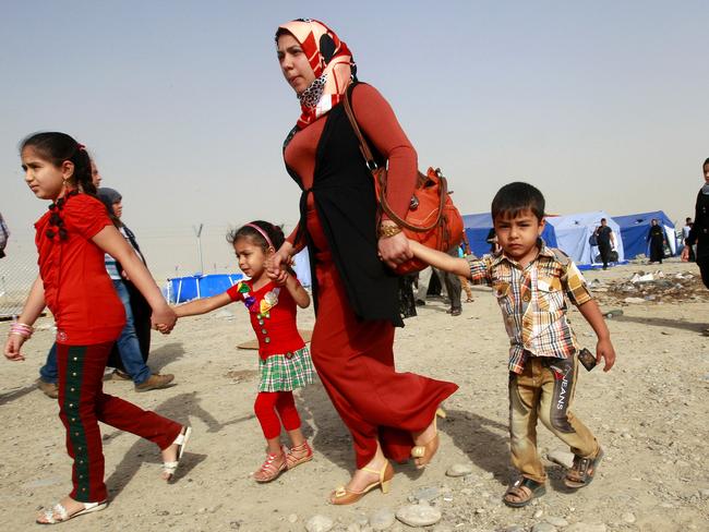 Refugees flee Mosul after the unrest in Iraq. Picture: AP