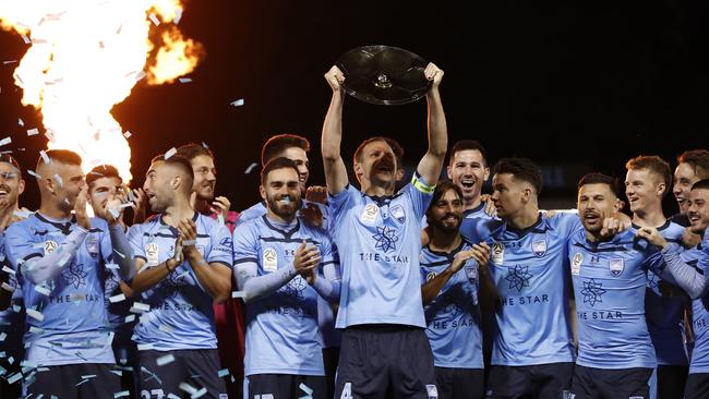 Sydney FC celebrate after they were presented with the Premiers Plate.