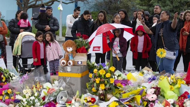 A memorial for Solomone Taufeulungaki in Deer Park is attended by members of his church. Picture: Sarah Matray