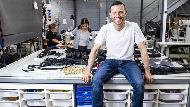 Melbourne Cup-winning jockey Brett Prebble at his Melbourne factory which makes high-quality whips, saddles and other riding gear. Picture: Aaron Francis