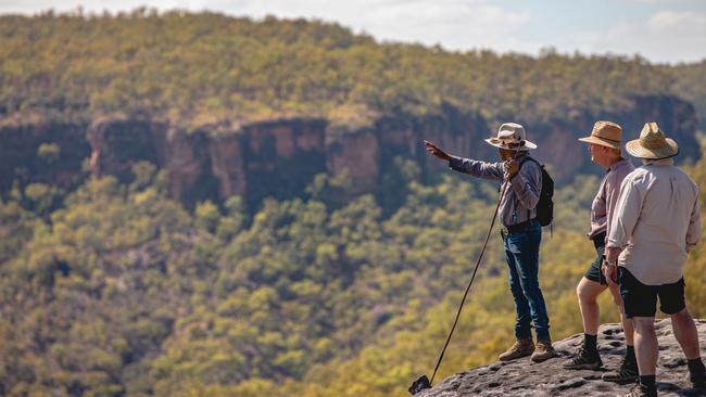 Johnny Murchison with guests on a Jarramali Rock Art Tour, Cape York, QLD.