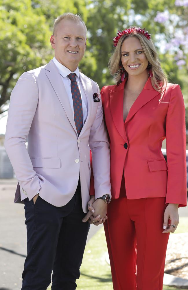 Brisbane Racing Club ambassador, breakfast radio presenter David ‘Luttsy’ Lutteral and swimmer Emily Seebohm, at Doomben Racecourse, are an item. Picture: Mark Cranitch