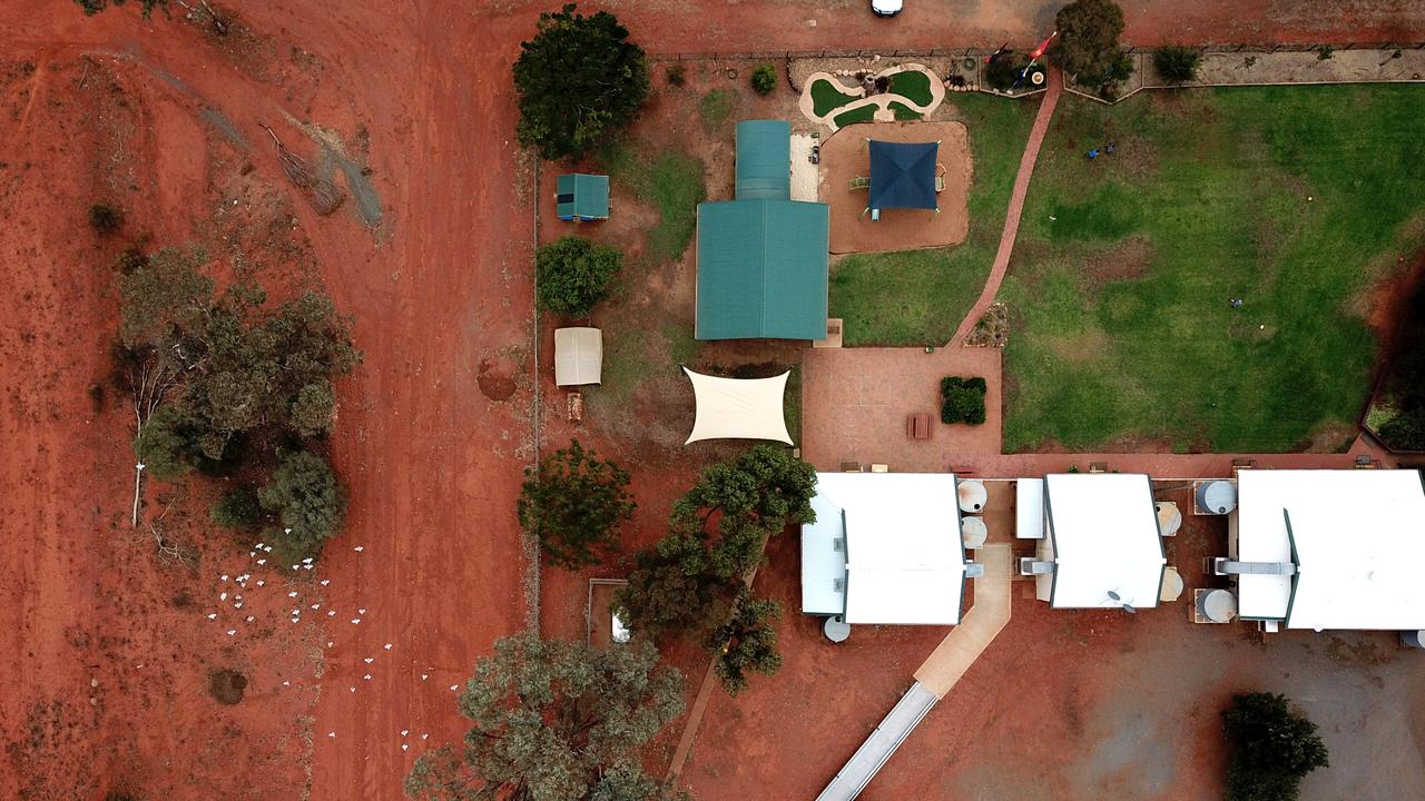 Hermidale Public School has green grass that lifts the spirits of its drought stricken community. Picture: Jonathan Ng