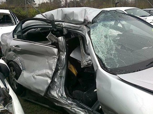 Sydney Kings player Jason Cadee's car after being hit by semi trailer on the M7 in 2010. Jason was seriously injured in the collision.