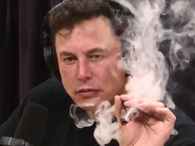 Tesla CEO Elon Musk appeared to smoke marijuana during a lengthy interview with comedian Joe Rogan that covered topics ranging from the dangers of artificial intelligence to the CEO's use of Twitter. PHOTO: THE JOE ROGAN EXPERIENCE