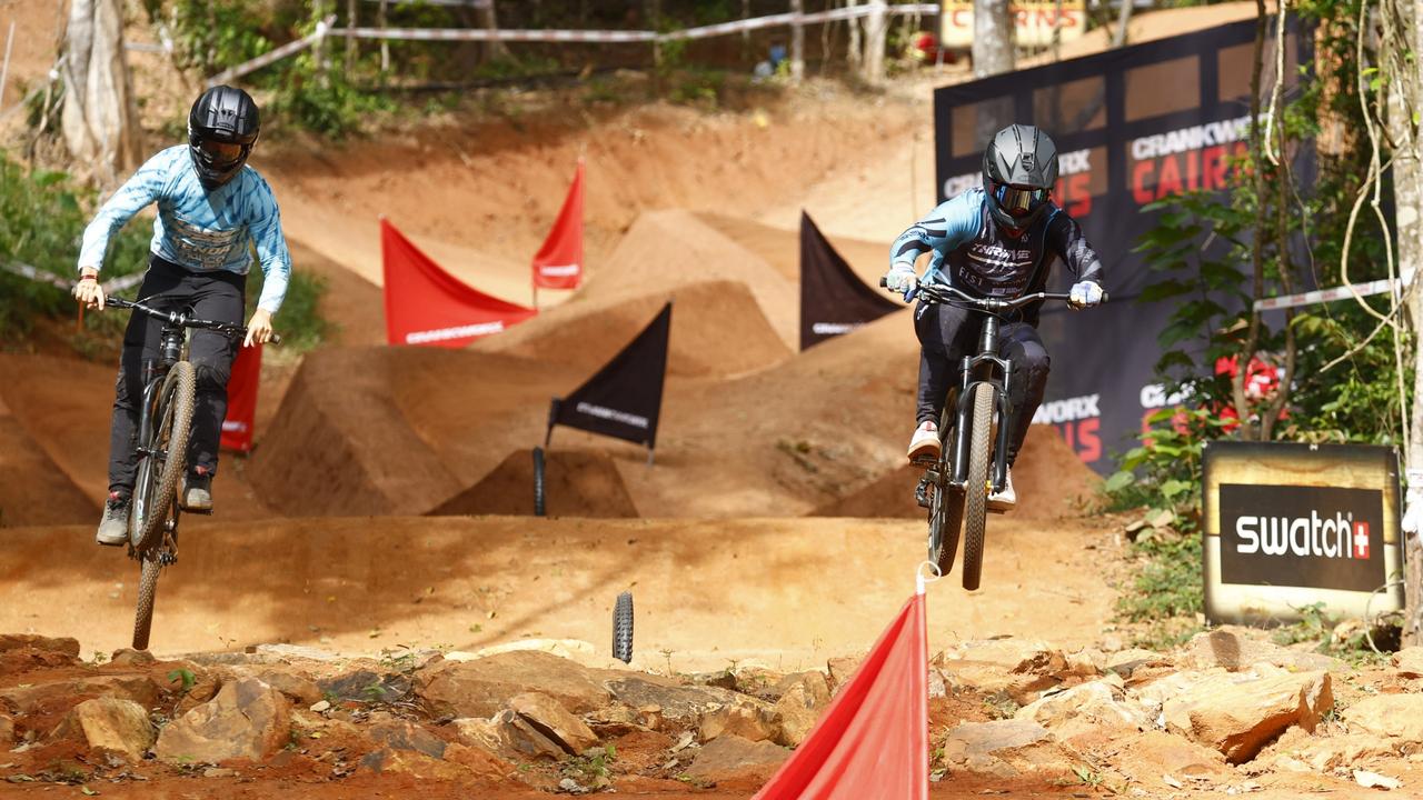 Jonathan Simek and Jayce Cunning compete in the Speed &amp; Style competition on Day Two of the Crankworx Cairns mountain bike festival, held at the Smithfield Mountain Bike Park. Picture: Brendan Radke