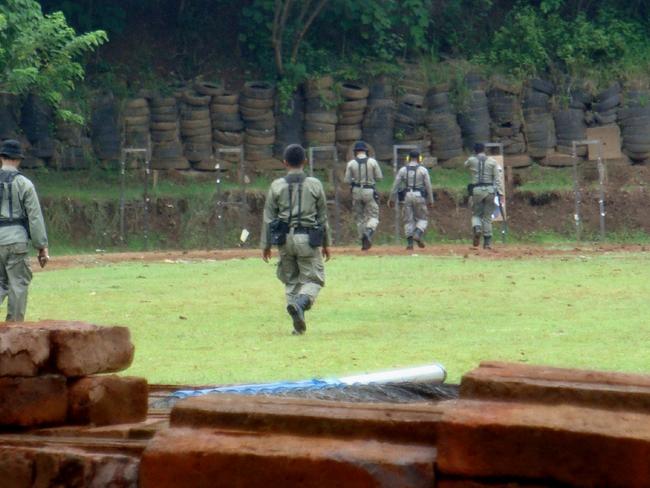 Some of Brimob, Indonesian Paramilitary Police practise shooting targets in Semarang, Central Java, Indonesia. The firing squad are chosen from the Brimob.