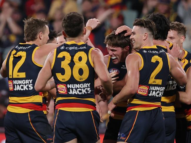 Daniel Curtin of the Crows celebrates his first career goal