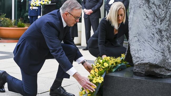 Prime Minister Anthony Albanese and Senator Katy Gallagher placing a wreath at Queen's Terrace. Picture: NCA NewsWire/Martin Ollman