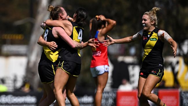 Richmond players celebrate victory against the Brisbane Lions. Picture: Daniel Carson/AFL Photos via Getty Images