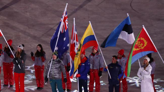 PYEONGCHANG-GUN, SOUTH KOREA - FEBRUARY 25:  Flag bearer Jarryd Hughes of Australia and flag bearer Billy Morgan of Great Britain participate in the Parade of Athletes during the Closing Ceremony of the PyeongChang 2018 Winter Olympic Games at PyeongChang Olympic Stadium on February 25, 2018 in Pyeongchang-gun, South Korea.  (Photo by Dean Mouhtaropoulos/Getty Images)